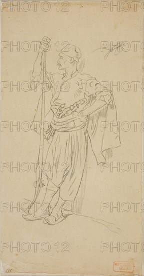 Armed Arab Leaning Against a Wall, n.d., Charles Bargue, French, 1826-1883, France, Graphite on buff wove paper, laid down on ivory wove paper, 222 × 118 mm