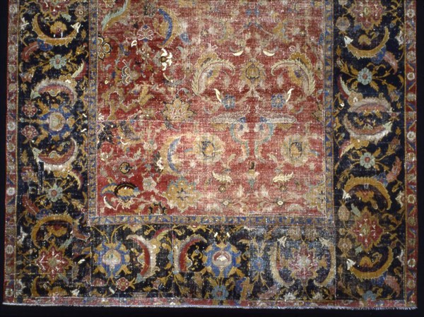 Carpet, Mid–17th century, India, possibly Agra, India, Cotton and wool, pain weave variation (supplementary wrapping wefts are enclosed between elements of paired ground wefts,  intervening ground wefts are single) with supplementary wrapping wefts forming cut pile through a technique known as "Ghiordes knots