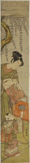 Young Man Holds a Kite for a Child, c. 1774, Isoda Koryusai, Japanese, 1735-1790, Japan, Color woodblock print, hashira-e, 26 1/8 x 4 5/8 in.