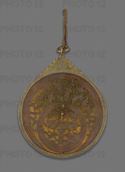 Astrolabe, Qajar dynasty (1796–1925), 18th century, with later additions, Iran, Isfahan, Iran, Brass with pierced and engraved decoration, 25.2 × 18.5 × 3 cm (9 15/16 × 7 1/4 × 1 3/16 in.)