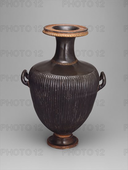 Hydria (Water Jar), 350/330 BC, Greek, Campania, Italy, Puglia, terracotta, black-glaze technique, with gilded raised clay decoration and ribbing, 50 × 35 × 28.5 cm (19 11/16 × 13 3/4 × 11 1/4 in.)