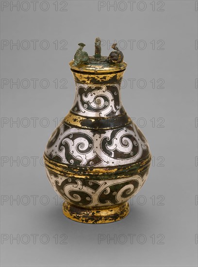 Covered Jar (Hu), Eastern Zhou dynasty, Warring States period (480–221 B.C.), late 4th/3rd century B.C., China, reportedly from Jincun, Henan province, China, Bronze inlaid with strand silver and gilded, H. 14.6 cm (5 3/4 in.), diam. 8.9 cm (3 1/2 in.)