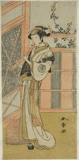 The Actor Nakamura Noshio I as Misao Disguised as a Komuso in the Play Kosode-gura no Tekubari, Performed at the Morita Theater in the Second Month, 1772 (?), c. 1772, Katsukawa Shunsho ?? ??, Japanese, 1726-1792, Japan, Color woodblock print, hosoban, 29 x 14.2 cm (11 7/16 x 5 9/16 in.)