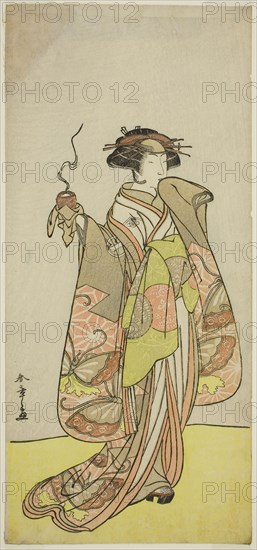 The Actor Ichikawa Monnosuke II as the Courtesan Kewaizaka no Shosho in the Play Sono Kyodai Fuji no Sugatami, Performed at the Morita Theater in the First Month, 1776, c. 1776, Katsukawa Shunsho ?? ??, Japanese, 1726-1792, Japan, Color woodblock print, hosoban, 32.7 x 15 cm (12 7/8 x 5 7/8 in.)