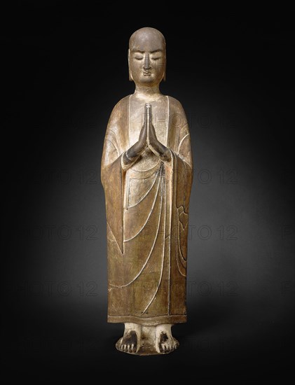 Monk, Sui Dynasty (589–618 A.D.), China, Limestone with traces of polychromy, H. (without base) 35 in., h. (with base) 42 1/2 in., diam. 9 1/4 in.