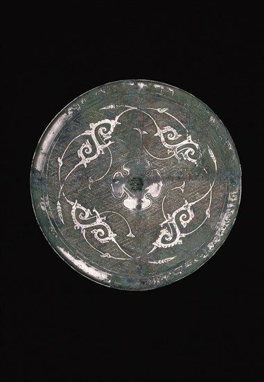 Mirror with Dragon Arabesques, Eastern Zhou dynasty, Warring States period or early Western Han dynasty, 3rd/2nd century B.C., China, Bronze, Diam. 20.8 cm (8 3/8 in.), Thickness: 0.2 cm (3/16 in.)