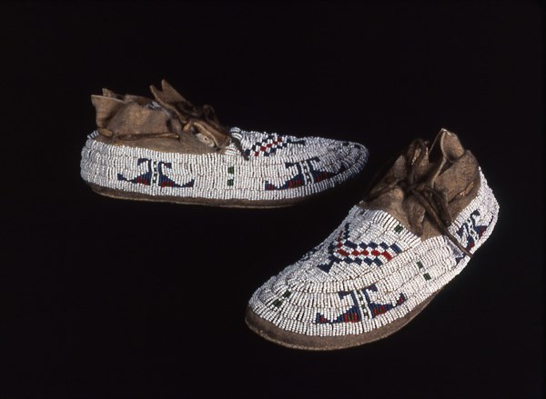 Pair of Moccasins, c. 1885, Arapaho, Plains, North America, Plains, Doe skin, sewn with sinew, decorated with beads, a:  7.1 x 22.3 x 9.4  cm (2 3/4 x 8 3/4 x 3 3/4 in.)
