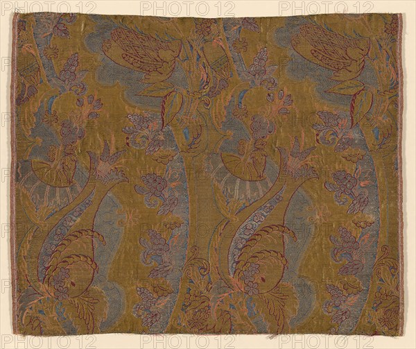 Panel (Dress Fabric), c. 1711, France or England, France, Silk and gilt-metal-strip-wrapped silk, warp-float faced 7:1 satin weave with supplementary binding warps tying supplementary brocading wefts and self-patterning ground wefts in 3:1 and 2:2 twill interlacings, 44.7 × 54.2 cm (17 5/8 × 21 3/8 in.)