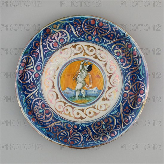 Plate with Cupid, 1530/40, Italian, Gubbio, Attributed to workshop of Giorgio Andreoli, Gubbio, Tin-glazed earthenware (maiolica), Diameter: 23.5 cm (9 1/4 in.)