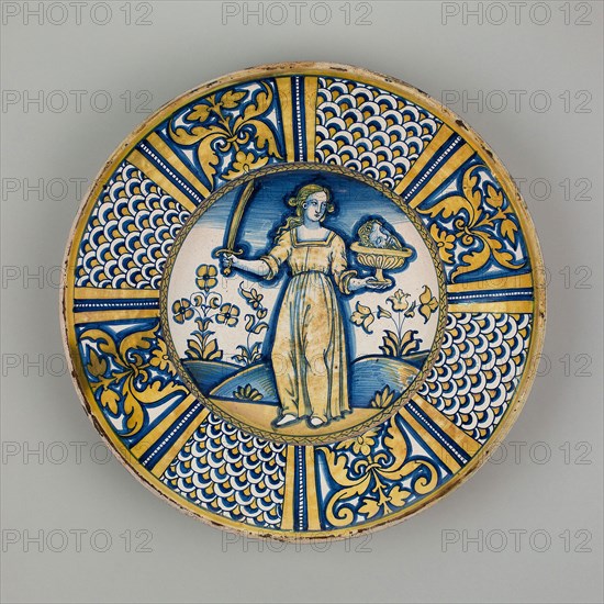 Display Plate with Judith Holding the Head of Holofernes, 1500/1530, Italian, Deruta, Deruta, Tin-glazed earthenware with copper luster (maiolica), Diameter: 38.7 cm (15 1/4 in.), H: 8.3 cm (3 1/4 in.)