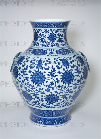 Vase with Loop Handles, Peony Scrolls, Eight Buddhist Emblems, and Waves, Qing dynasty (1644–1911), Qianlong reign mark and period (1736–1795), China, Porcelain painted in underglaze blue, H. 50.0 cm (19 11/16 in.), diam. 41.8 cm (16 7/16 in.)