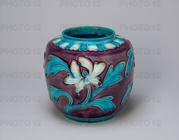 Jar with Peonies and lid, Ming dynasty (1368–1644), 16th century, China, Fahua ware, stoneware with underglaze molded decoration and blue, purple, and white glazes, wood, H. 16.1 cm (6 5/16 in.), diam. 17.5 cm (6 7/8 in.)