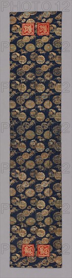 Ôhi (Stole), late Edo period (1789–1868), 1801/25, Japan, make of pieces of nishiki-kinran, silk compound weave, with ground of dark blue flecked pattern and circular motifs woven in colored silks and kinran, cut paper with gold foil., 145.8 x 29.9 cm (57 3/8 x 11 3/4 in.)