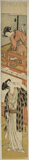Young Woman Throwing a Ball at a Young Man, c. 1774, Isoda Koryusai, Japanese, 1735-1790, Japan, Color woodblock print, hashira-e, 27 1/4 x 4 9/16 in.