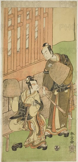 The Actors Ichikawa Komazo II as Soga no Juro Sukenari (right), and Ichikawa Danjuro V as Soga no Goro Tokimune (left), in Komuso Attires, in the Play Sakaicho Soga Nendaiki, Performed at the Nakamura Theater in the First Month, 1771, c. 1771, Katsukawa Shunsho ?? ??, Japanese, 1726-1792, Japan, Color woodblock print, hosoban, 32.7 x 15.5 cm (12 7/8 x 6 1/8 in.)