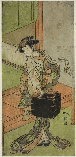 The Actor Yamashita Kinsaku II as Miyagino Disguised as a Hairdresser in the Play Kosode-gura no Tekubari, Performed at the Morita Theater in the Second Month, 1772 (?), c. 1772, Katsukawa Shunsho ?? ??, Japanese, 1726-1792, Japan, Color woodblock print, hosoban, 29.6 x 14 cm (11 5/8 x 5 1/2 in.)