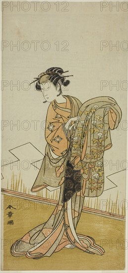 The Actor Nakamura Riko I as the Courtesan Wakamatsu (?) in the Play Gohiiki Kanjincho (?), Performed at the Nakamura Theater (?) in the Eleventh Month, 1773 (?), c. 1773, Katsukawa Shunsho ?? ??, Japanese, 1726-1792, Japan, Color woodblock print, hosoban, 32.3 x 15.1 cm (12 11/16 x 5 15/16 in.)
