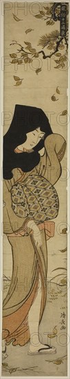 Woman with Black Hood in Windblown Leaves, from the series Twelve Scenes of Popular Customs (Fuzoku juni tsui), c. 1783, Torii Kiyonaga, Japanese, 1752-1815, Japan, Color woodblock print, hashira-e, 66.8 x 11.5 cm