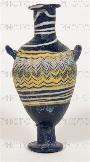 Bottle, early 3rd/early 2nd century BC, Eastern Mediterranean or Italian, Eastern Mediterranean Region, Glass, core-formed technique, 10.5 × 5.4 × 4.3 cm (4 1/8 × 2 1/8 × 1 11/16 in.)