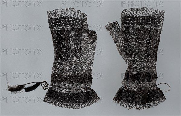 Pair of Mittens, c. 1850, England or France, England, Silk, bands of bunch, spider, and square netting, embroidered in cloth and overcast stitches, cotton cords with silk cut tassels, a: 18.8 × 11.4 cm (7 3/8 × 4 1/2 in.)