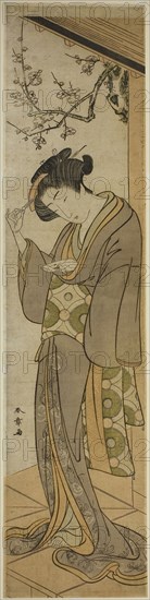 Woman on a Verandah About to Open a Letter, mid–late 1770s, Katsukawa Shunsho ?? ??, Japanese, 1726-1792, Japan, Color woodblock print, wide hashira-e, 69 x 16.7 cm (27 x 6 1/2 in.)
