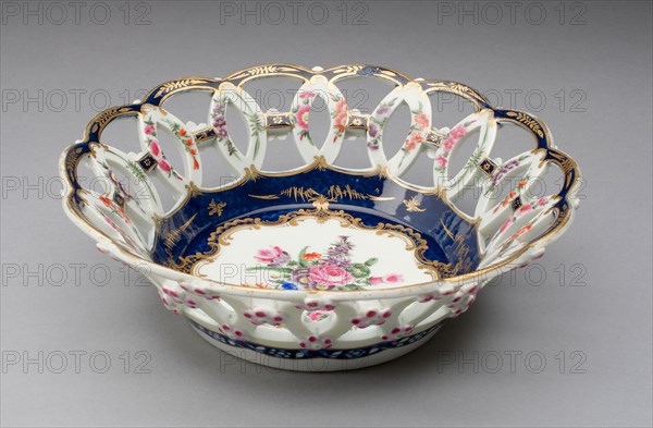 Dessert Basket, c. 1770, Worcester Porcelain Factory, Worcester, England, founded 1751, Worcester, Soft-paste porcelain, underglaze blue, polychrome enamels and gilding, Diam. 21.1 cm (8 5/16 in.), H. 6.7 cm (2 5/8 in.)