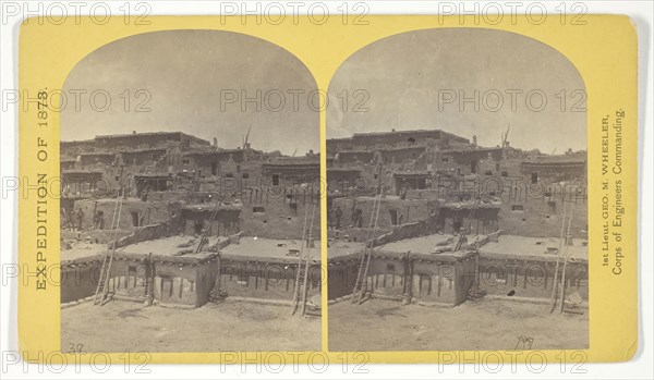 Indian Pueblo of Zuni, New Mexico, view from the interior. The Pueblo or town, encloses a quadrangular area within which are the ruins of a church built under the direction of the Jesuit missionaries. The houses are built one above the other to the height of five or six stories. The entrances are mostly from the top, the ascent and descent being made by ladders, 1873, Timothy O’Sullivan (American, born Ireland, 1840–1882), commissioned by George Wheeler for the War Department, Corps of Engineers, U.S. Army, United States, Albumen print, stereo, No. 16 from the series "Geographical Explorations and Surveys West of the 100th Meridian