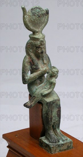Statuette of the Goddess Isis Holding the God Horus, Third Intermediate Period–Late Period, Dynasty 21–31 (about 1069–332 BC), Egyptian, Egypt, Bronze, 9.9 × 3.5 × 4.1 cm ( 3 7/8 × 1 3/8 × 1 5/8 in.) (without base)