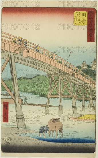 Okazaki: Yahagi Bridge on the Yahagi River (Okazaki, Yahagigawa Yahagi no hashi), no. 39 from the series Famous Sights of the Fifty-three Stations (Gojusan tsugi meisho zue), also known as the Vertical Tokaido, 1855, Utagawa Hiroshige ?? ??, Japanese, 1797-1858, Japan, Color woodblock print, oban, 36.8 x 22.5 cm (14 1/2 x 8 7/8 in.)