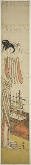 Beauty and Morning Glories, n.d., Suzuki Harunobu ?? ??, Japanese, 1725 (?)-1770, Japan, Color woodblock print, hashira-e, 68.9 x 12 cm (27 x 4 3/4 in.)