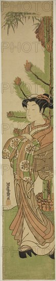 Courtesan in Front of New Year’s Decoration of Pine and Bamboo, c. early 1770s, Isoda Koryusai, Japanese, 1735-1790, Japan, Color woodblock print, hashira-e