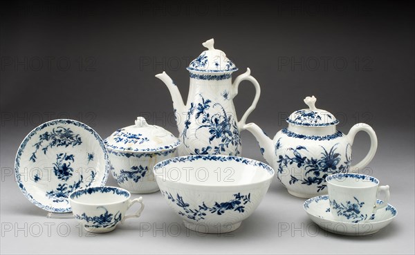 Tea Set, c. 1760, Worcester Porcelain Factory, Worcester, England, founded 1751, Worcester, Soft-paste porcelain, underglaze blue decoration, Coffee pot: h. 8 3/4 in. with cover;Teapot: h. 6 1/4 in. with cover, Sugar bowl: 4 1/2 in. with cover, Teacup: 1 3/4 in. x 2 7/8 in., Saucer: diam. 4 3/4 in., Coffee cup: 2 1/4 x 2 5/8 in., Saucer: 4 1/2 in., Slop bowl: 2 13/16 x 5 7/8 in.