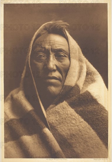 Middle Calf-Piegan, 1900, Edward S. Curtis, American, 1868–1952, United States, Photogravure, plate 202 from "The North American Indian, Volume 6" (1911), 39.1 x 26.3 cm (image), 45.2 x 29.6 cm (paper), 56 x 46.5 cm (mount)