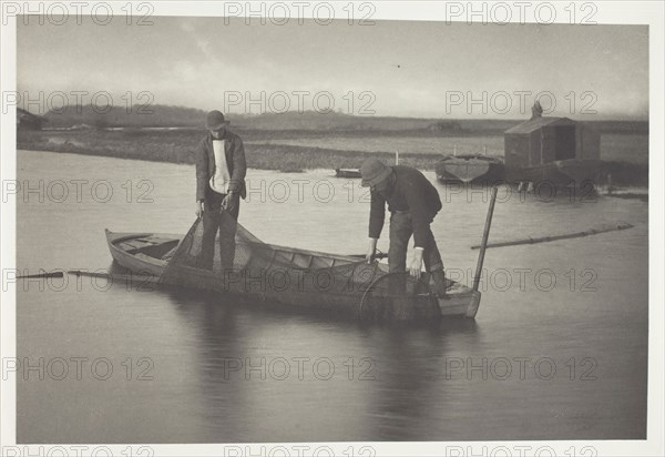 Taking up the Eel-Net, 1886, Peter Henry Emerson, English, born Cuba, 1856–1936, England, Platinum print, pl. VII from the album "Life and Landscape on the Norfolk Broads" (1886), edition of 200, 18.9 × 28.6 cm (image/paper), 28.6 × 40.8 cm (album page)