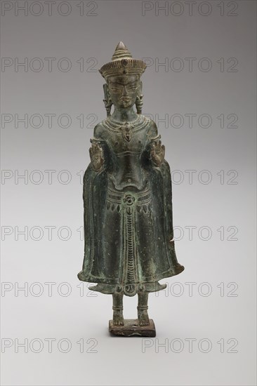 Crowned Buddha with Hands in Gesture of Teaching (Vitarkamudra), Angkor period, late 12th/early 13th century, Thailand (northeastern), Thailand, Bronze, 15.7 x 5.8 x 2.3 cm (6 1/8 x 2 1/4 x 7/8 in.)