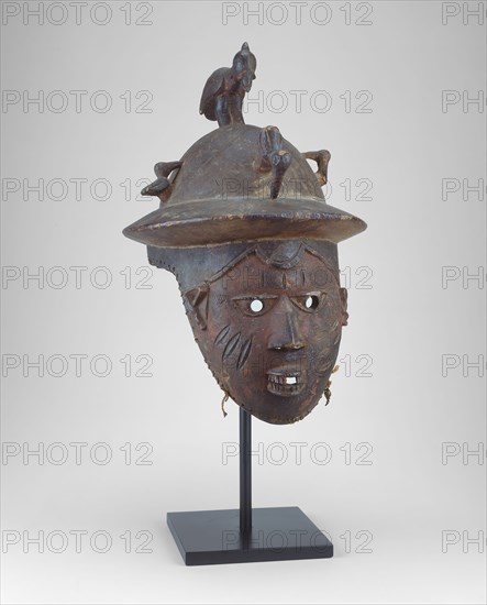 Mask for Egungun (Ere Egungun), Late 19th century, Yoruba, Iseyin, Nigeria, Coastal West Africa, Nigeria, Wood and pigment, 39.4 × 25.4 × 30.5 cm (15 1/2 × 10 × 12 in.)