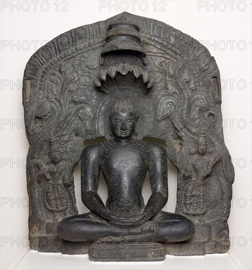 Jaina Tirthankara Parshvanatha with Serpent Hood Seated in Meditation (Dhyanamudra), 12th century, India, Karnataka, Karnataka, Chlorite, 85.3 x 74.0 x 23.8 cm (33 9/16 x 29 1/8 x 9 3/8 in.)