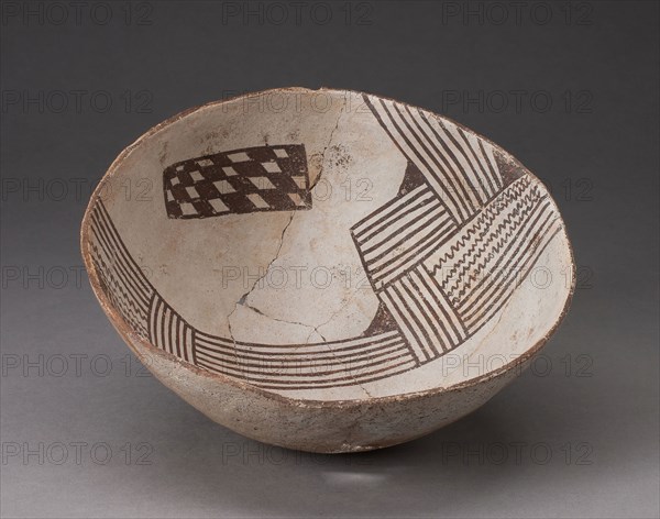 Bowl with Bold, Irregular Geometric Bands of Stripes, Zigzag, and Checkerboard Motifs, A.D. 850/950, Cibola, Posibly Kiatuthlanna Black-on-white, East-central Arizona or west-central New Mexico, United States, Arizona, Ceramic and pigment, Diam. 18.4 cm (7 1/4 in.)