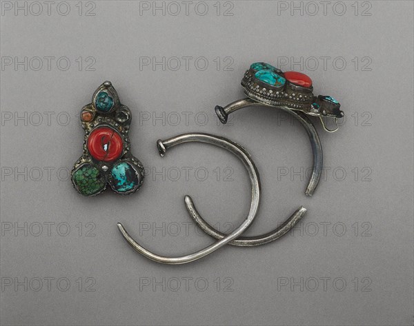 Earring, 18th century, Tibet, Tibet, Turquoise and coral set in silver, 8.5 x 6 x 3.5 cm, 8 x 6 x 3 cm, Woman’s Robe, Qing dynasty (1644–1911), 1840/60, Manchu, China, Silk, embroidered, Height: 54 in.