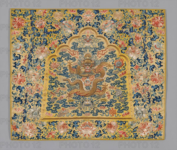 Panel (Furnishing Fabric), Qing dynasty(1644–1911), 1860/80, China, Golden yellow silk embroidered with a dragon in gold thread surrounded by clouds in the center, surrounded further by a border of chyrsanthemums and foliage in shades of cobalt blue and terracotta, 63.2 × 74.2 cm (24 7/8 × 29 1/4 in.)