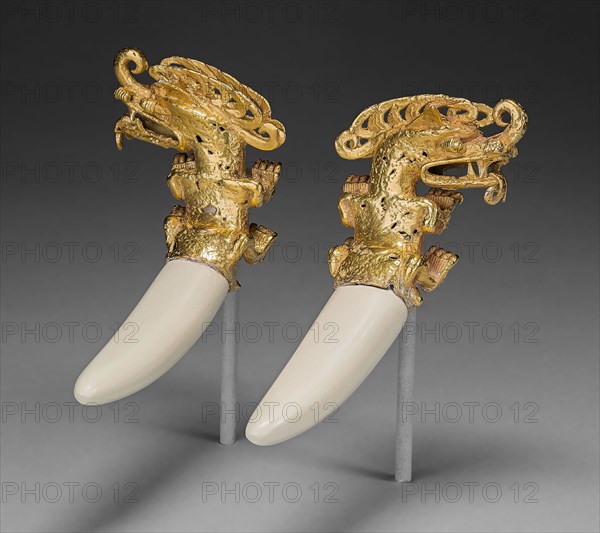 Double Pendant in the Form of a Mythical Saurian with Tusks, A.D. 800/1200, Coclé, Coclé province, Panama, Panama, Gold with plaster restoration of boar tusks, 6 × 7 × 2.32 cm (2 3/8 × 2 3/4 × 7/8 in.)