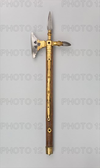 Horseman’s Axe, early 16th century, Spanish or Flemish, Probably, Spain, Steel with gilding, brass, iron, wood (oak), and attached tassel, L. 64.8 cm (25 1/2 in.)
