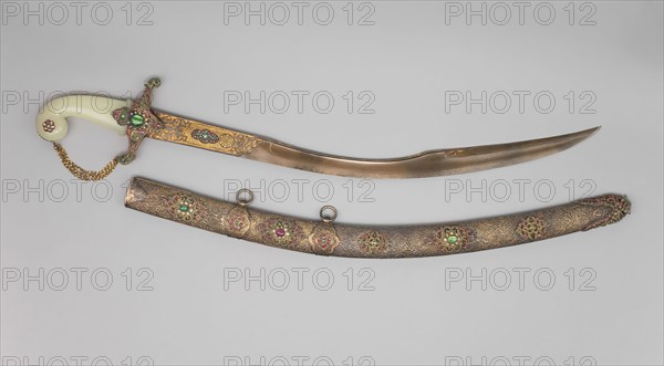 Saber (Kiliç) with Scabbard, late 19th century, Blade inscribed 1099 Hejira [A.D. 1687], Ottoman Turkish, Turkey, "Damascus" steel, gold, gilt brass, rubies, emeralds, diamonds, jade, and wood, Blade L. 71.1 cm (28 in.)