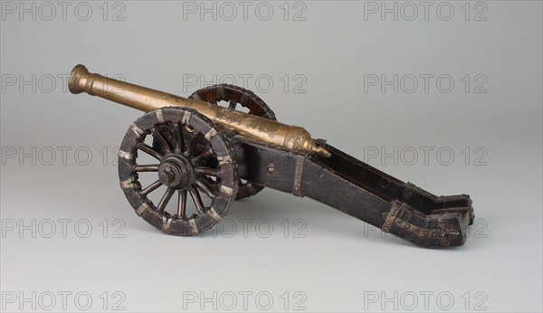 Model of a Bronze Field Cannon, 1775/1800, Central European, Central Europe, Bronze, wood, and iron, Length overall of cannon: 13 3/4 in. (34.9 cm)