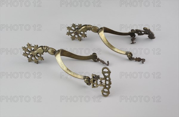 Pair of Rowel Spurs, c. 1630, Western European, Western Europe, Brass, L. 15.9 cm (6 1/4 in.), W. 8.9 cm (3 1/2 in.)