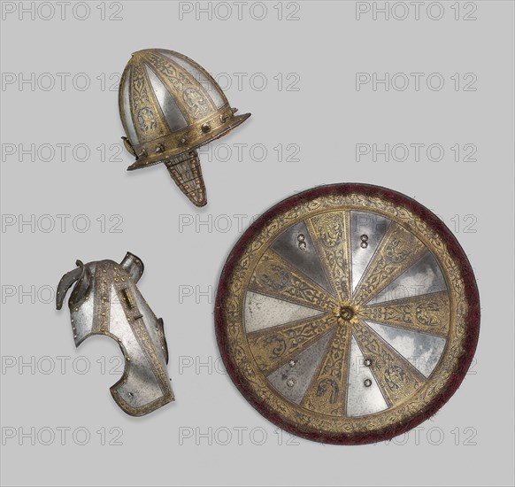 Infantry Garniture of a Target (Shield) and Pointed Morion, 1570/80, North Italian, Milan, Milan, Steel, brass, gilding, silk velvet, horse hair, silk, and silver-gilt fringe, Rondache diameter: 55.9 cm (22 in.)