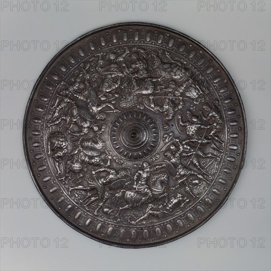 Parade Shield of Henry II, King of France (reigned 1547-1559), copy of, 1909 (copy of c. 1555 style), Simoni of Geneva, Switzerland, Geneva, active c. 1910, Geneva, Iron, traces of gilding, Diam. 55.9 cm (22 in.)