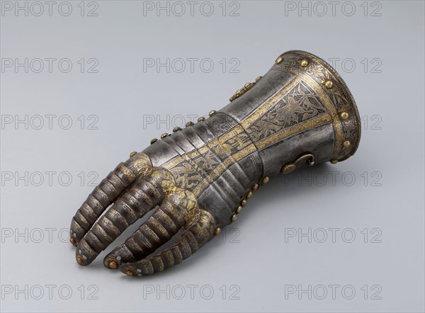 Gauntlet from a Tournament Garniture of a Hapsburg Prince, 1571, Attributed to Anton Peffenhauser (German 1525—1603), Augsburg, Augsburg, Steel, gilding, brass, and leather, 11.4 × 10.8 × 26.7 cm (4 1/2 × 4 1/4 × 10 1/2)