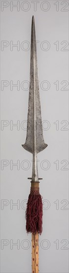 Partisan, c. 1520, Italian, Italy, Steel, wood (pine), iron, velvet, and tassel, Blade with socket L. 91.8 cm (36 1/8 in.)