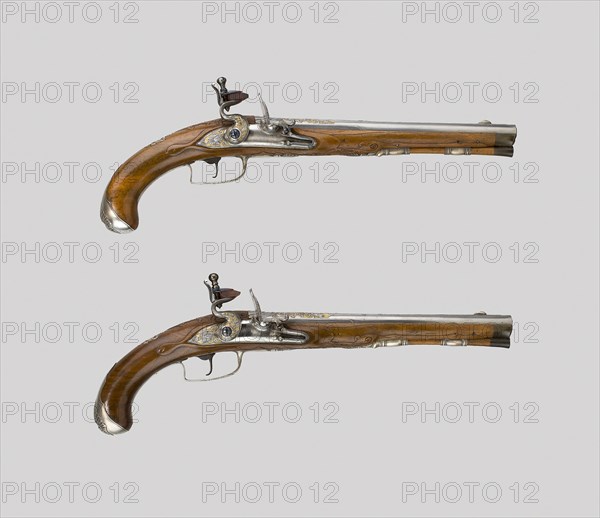 Pair of Flintlock Pistols, c. 1720/30, French, France, Walnut, steel, and silver, Overall L.: 41.3 cm (16 1/4 in.)